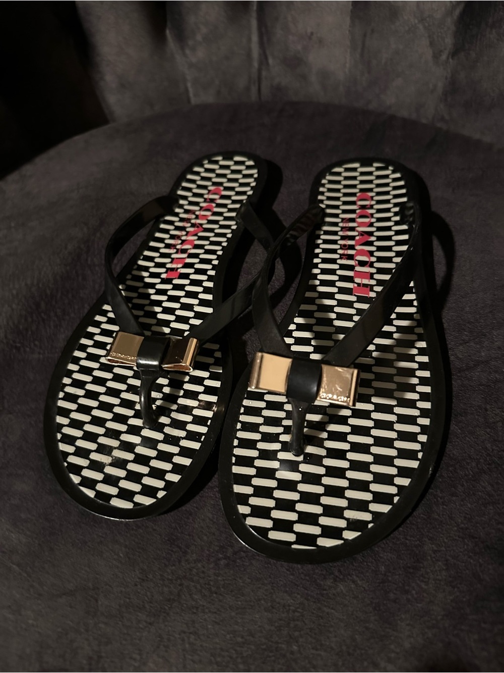Coach Black Jelly Thong Sandals with Gold Bow Accent - Picture 2 of 7